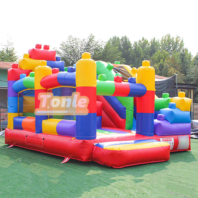 Lego block inflatable castle slide combo