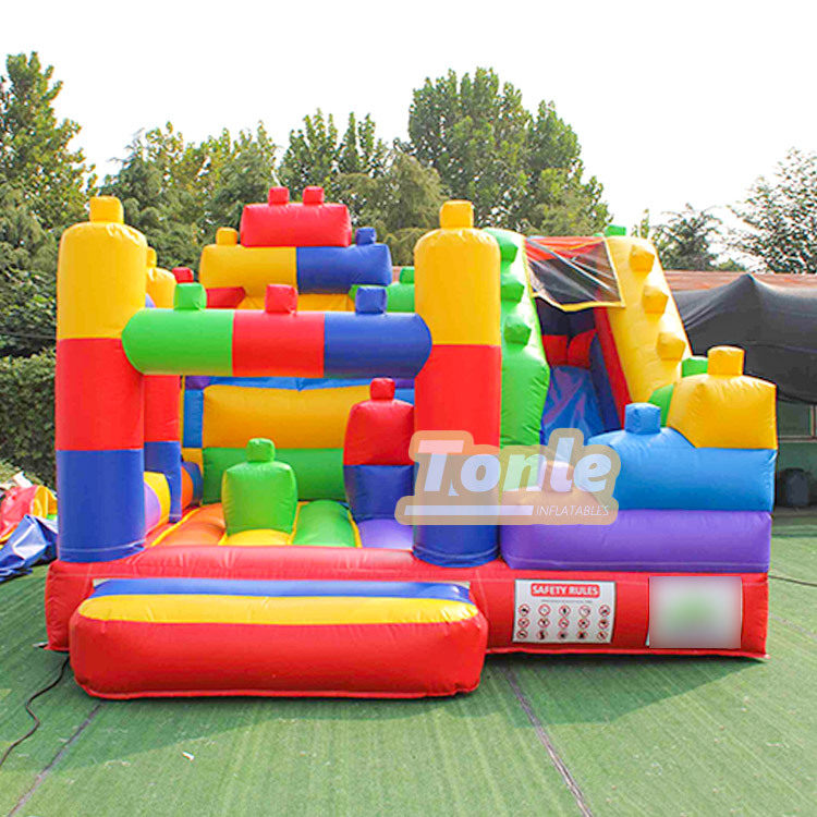Lego block inflatable castle slide combo