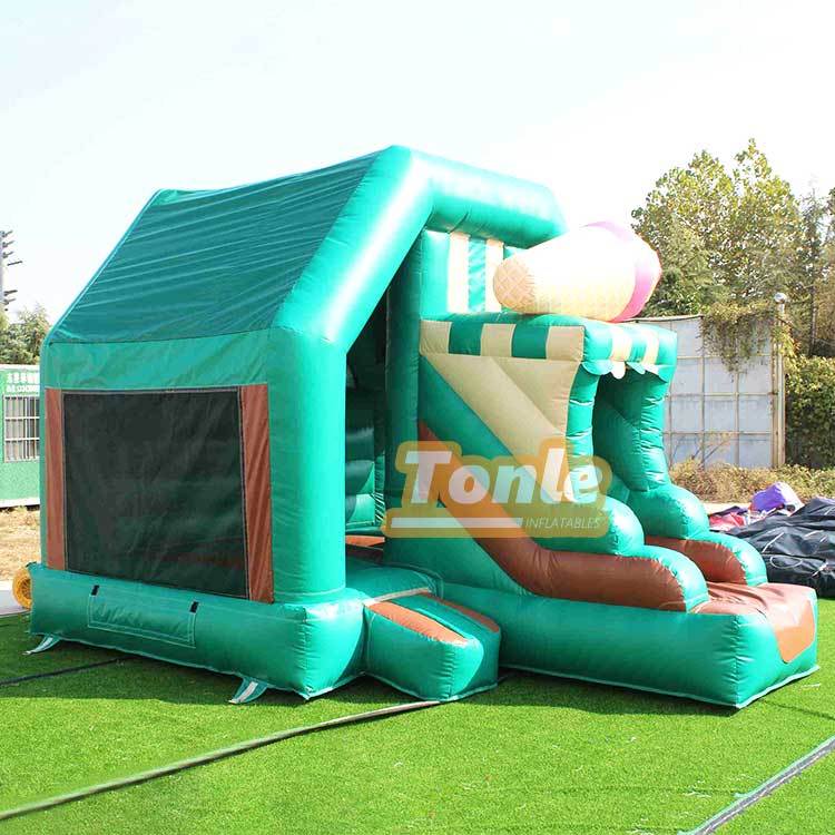 Ice cream themed bouncy castle with slide