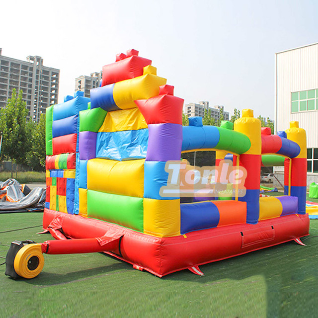 Lego block inflatable castle slide combo