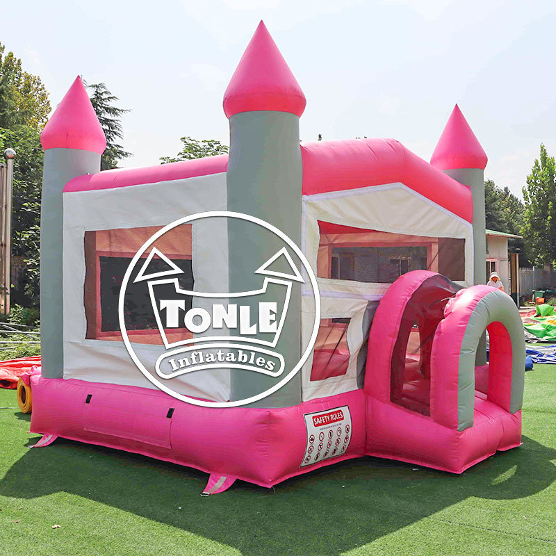 Classic red, yellow and blue castle-style inflatable bounce house for sale
