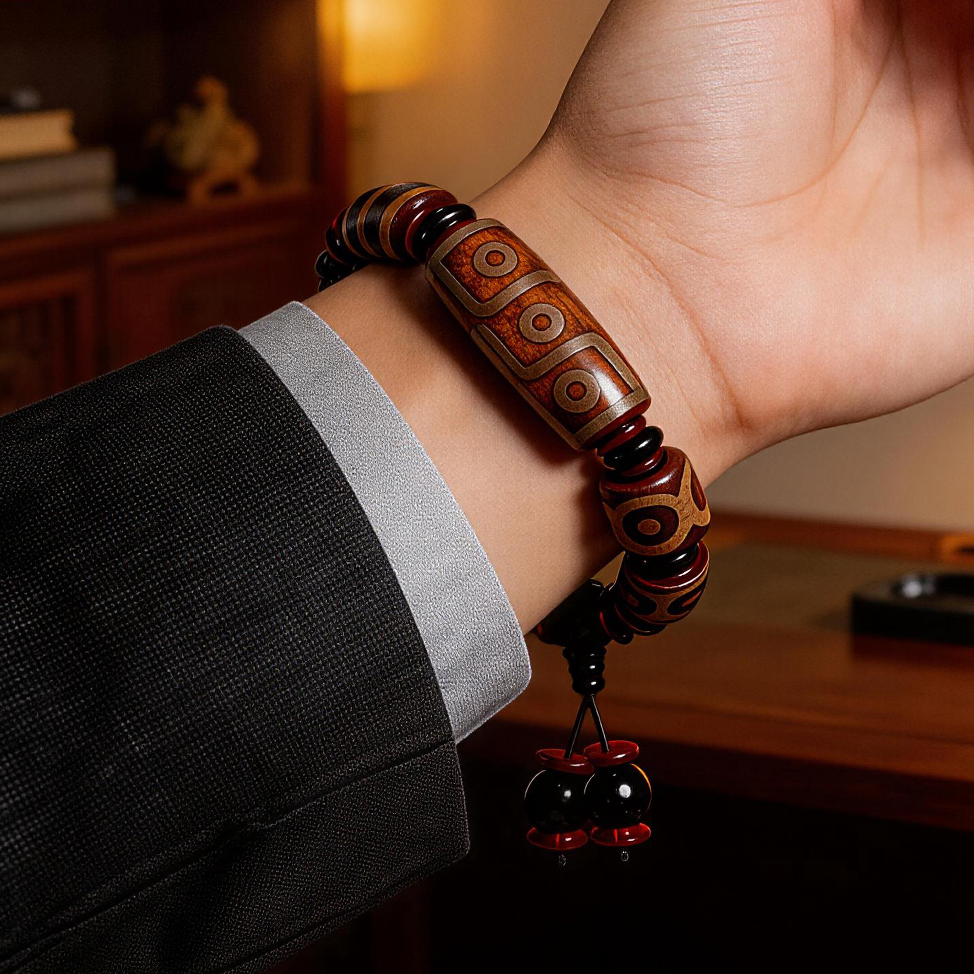 Three & Nine-Eyed Dzi Agate Barrel Bead Bracelet