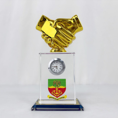 Clear with gold handshake
