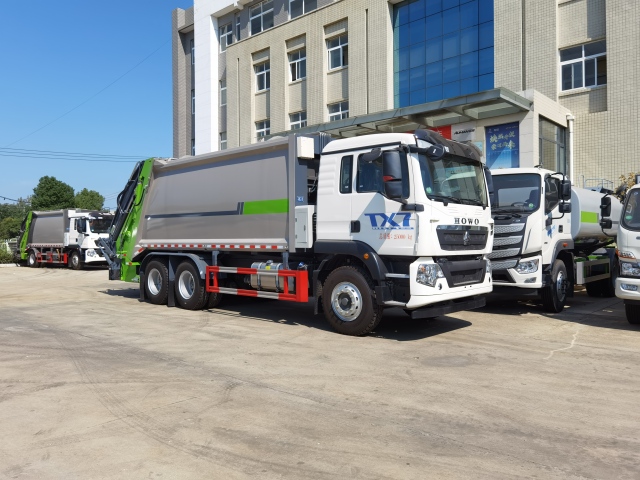 Мусоровоз HOWO с задней загрузкой и компактором, объемом 24 м³, Suizhou Hongda Automobile Sales Co., Ltd., Мусоровоз HOWO с задней загрузкой и компактором, объемом 24 м³.