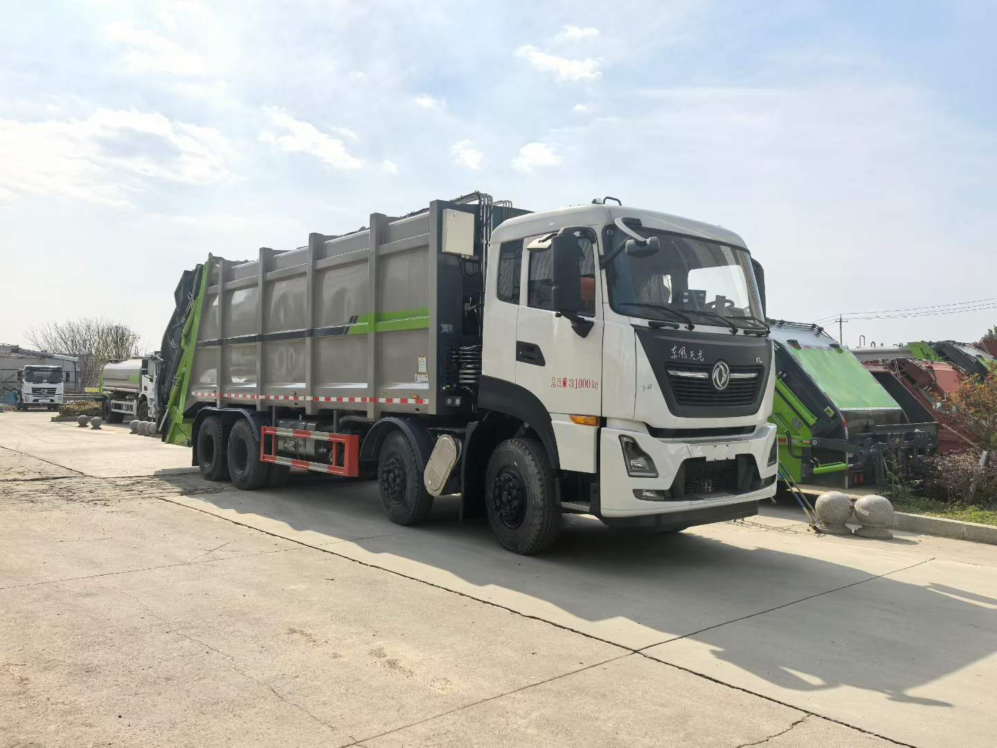 Мусоровоз HOWO с задней загрузкой и компактором, объемом 40 м³, Suizhou Hongda Automobile Sales Co., Ltd., Мусоровоз HOWO с задней загрузкой и компактором, объемом 40 м³.