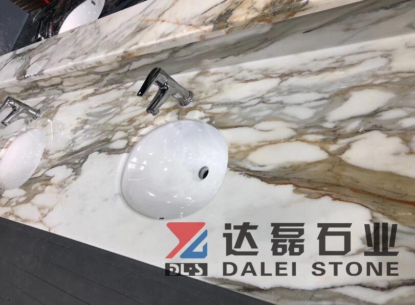 Calacatta White Marble Countertops With Golden Lines and Sinks Cut