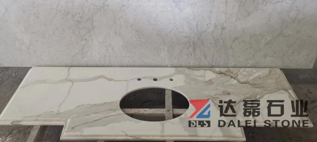 Calacatta White Marble Countertops With Golden Lines and Sinks Cut