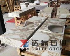 Calacatta White Marble Countertops With Golden Lines and Sinks Cut