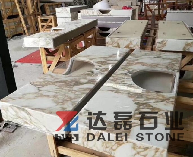 Calacatta White Marble Countertops With Golden Lines and Sinks Cut
