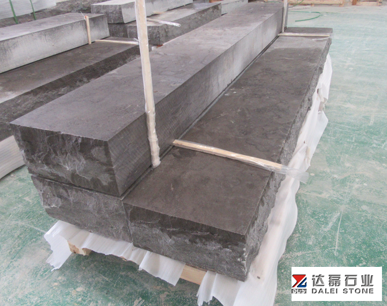 Blue Limestone Rock Face Treads with Chuck at Landscape