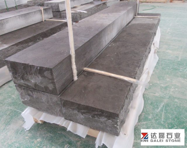 Blue Limestone Rock Face Treads with Chuck at Landscape