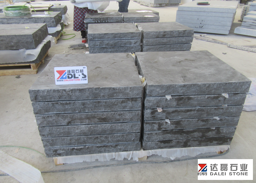 Blue Limestone Rock Face Treads with Chuck at Landscape