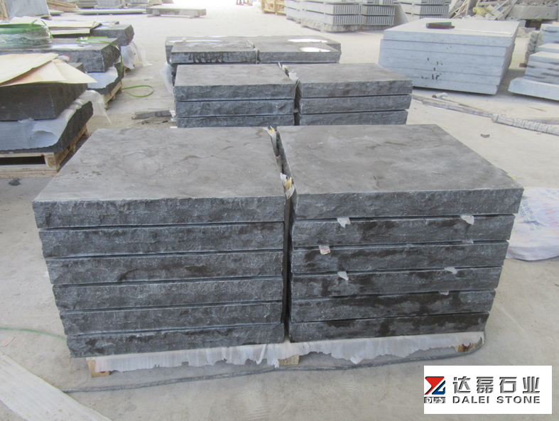 Blue Limestone Rock Face Treads with Chuck at Landscape