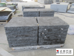 Blue Limestone Rock Face Treads with Chuck at Landscape