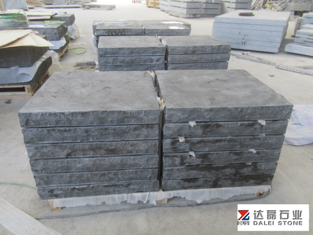 Blue Limestone Rock Face Treads with Chuck at Landscape