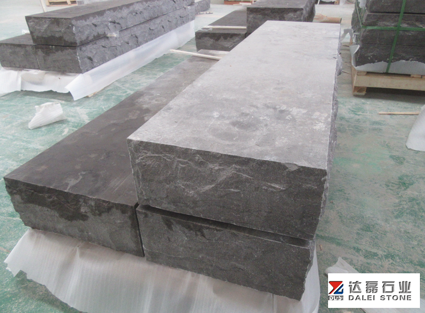 Blue Limestone Rock Face Treads with Chuck at Landscape