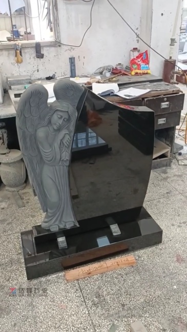 Black Granite Leaning Angel Carved Tombstone Monument