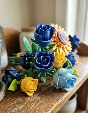 Dusty building block flowers on a display desk