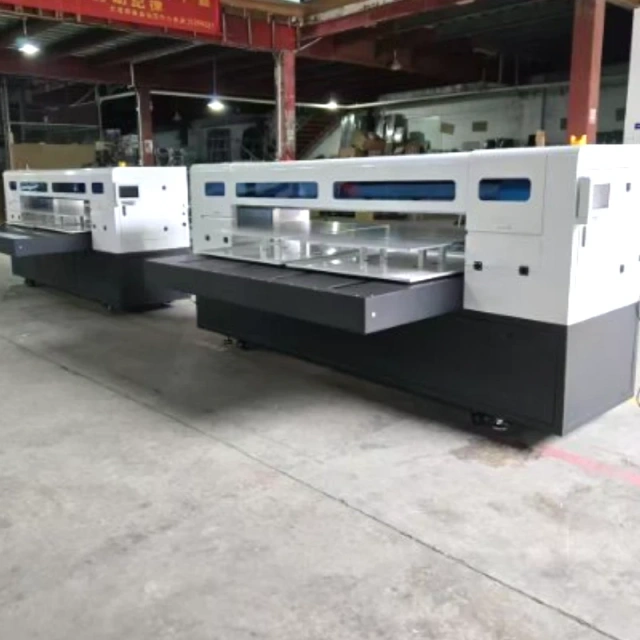 2 sets Cosmox Dual Table DTG Printer in workshop
