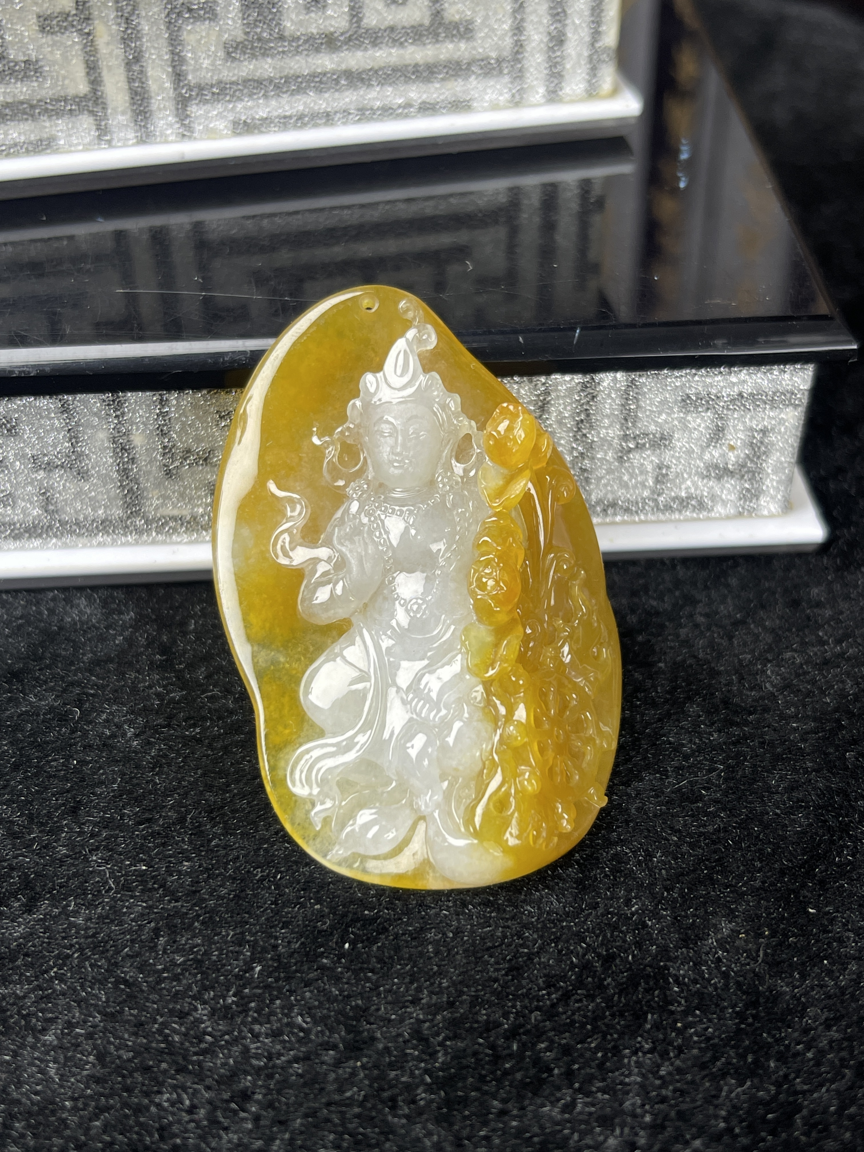 Golden yellow delicately carved White Tara pendant