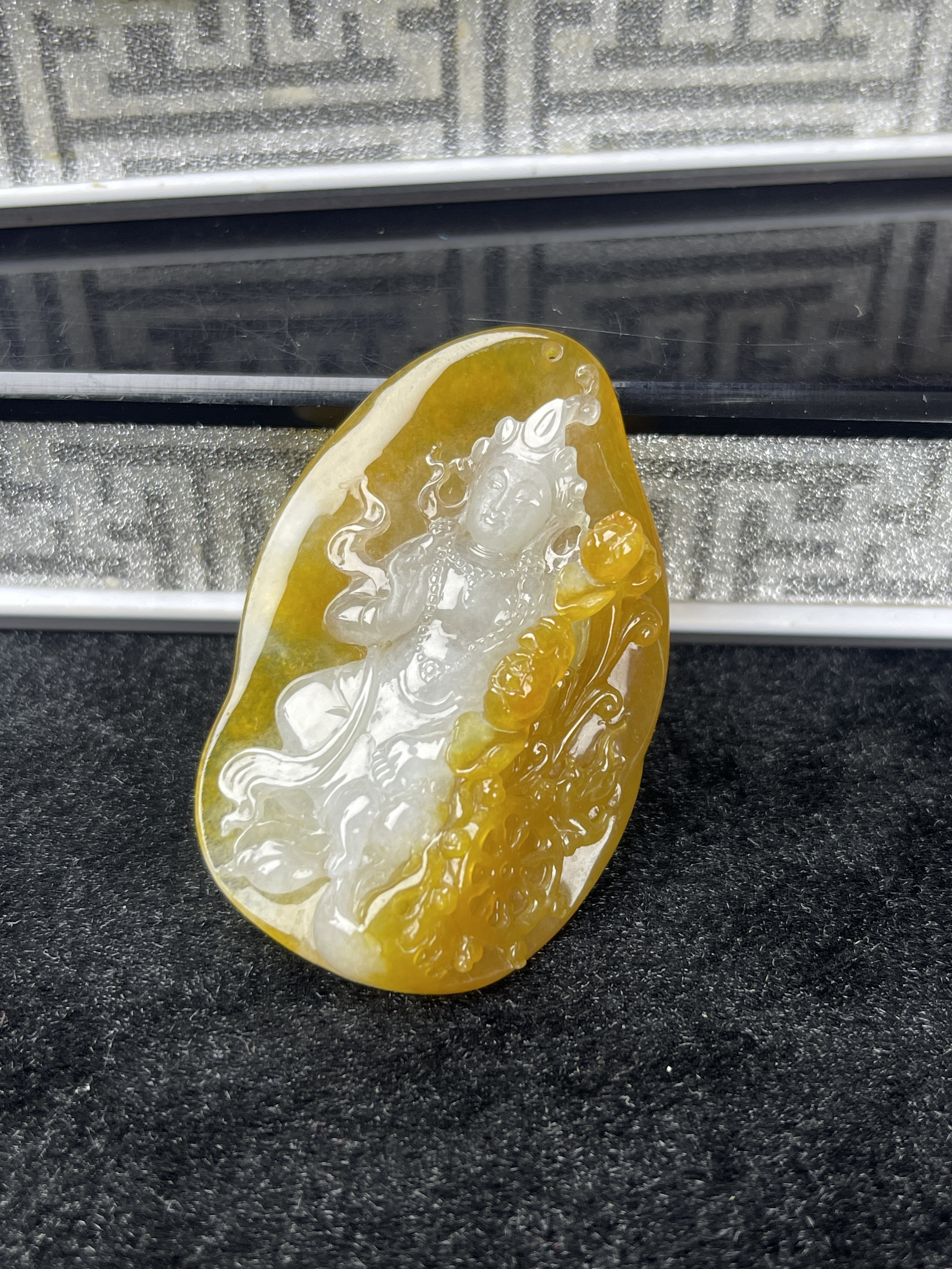 Golden yellow delicately carved White Tara pendant