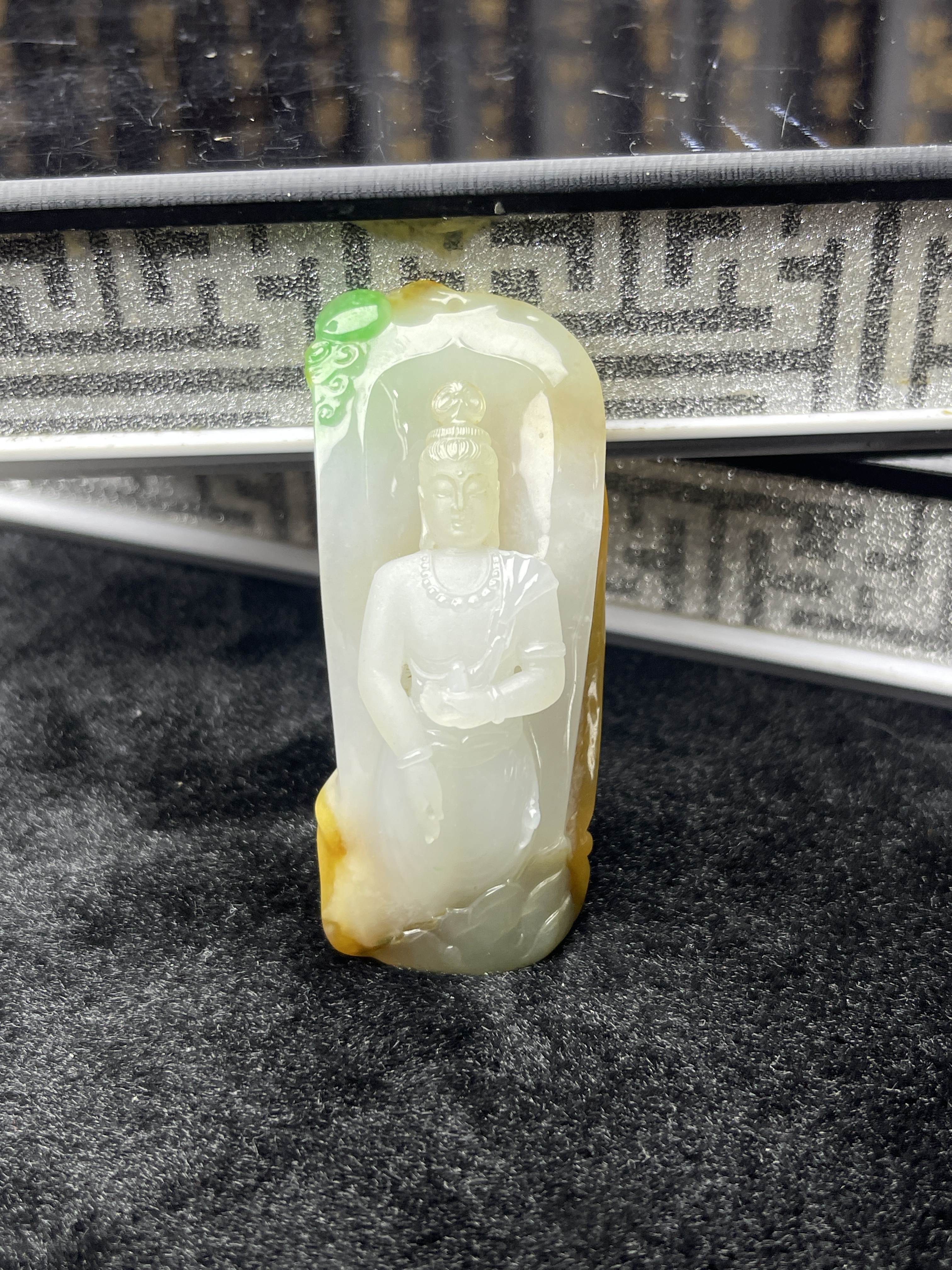 Yellow and green jade Guanyin pendant in a cute little bottle