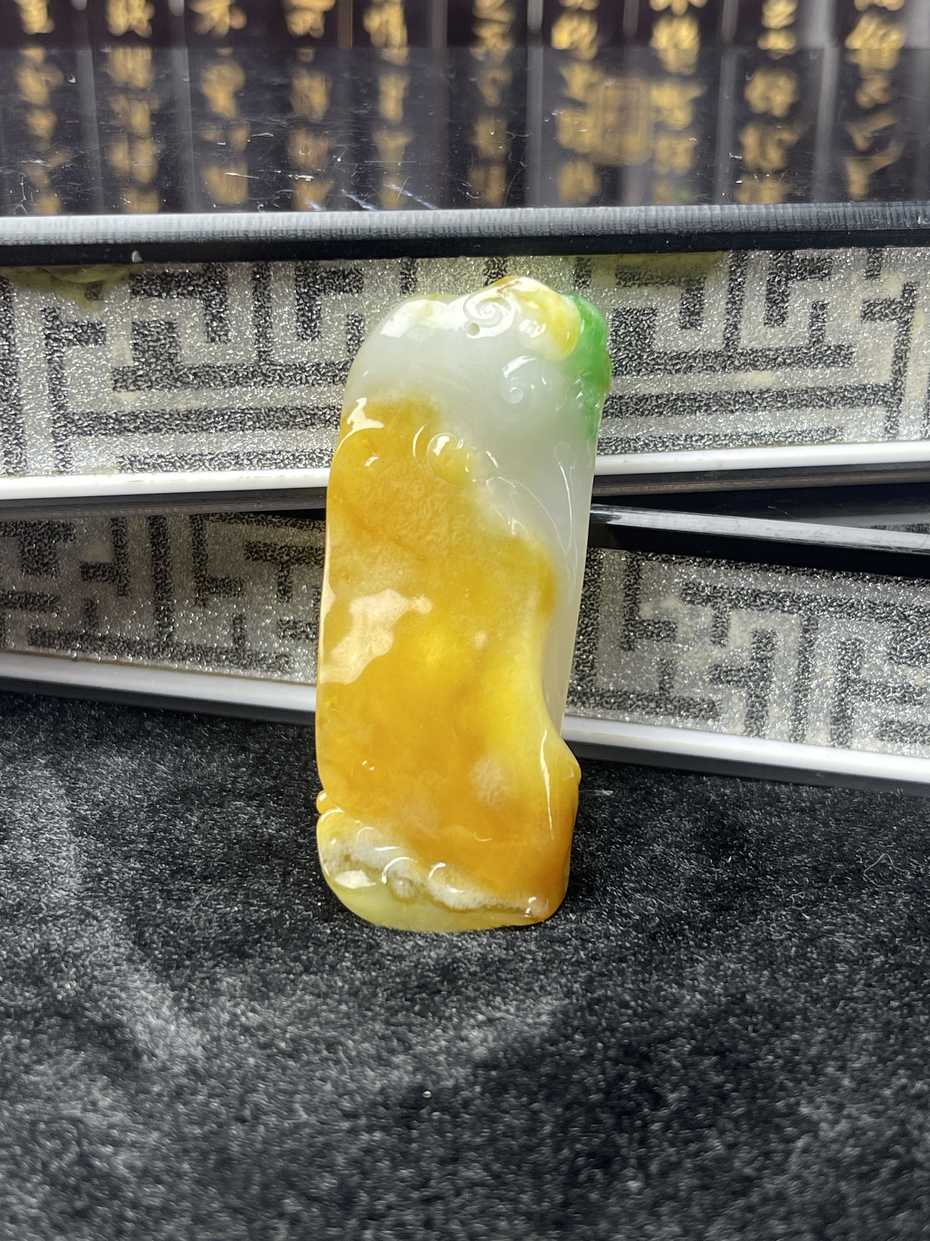 Yellow and green jade Guanyin pendant in a cute little bottle