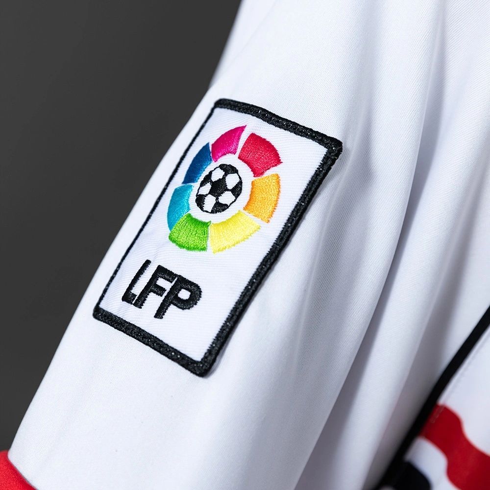 Detailed shot of the embroidered LFP La Liga patch on the sleeve of the Retro Osasuna 2010-11 Away Jersey fan version