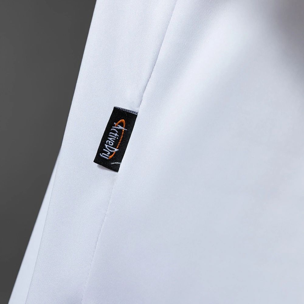 Close-up of the ‘Kumepli’ fabric tag on the side seam of the Osasuna 2010-11 retro away jersey.