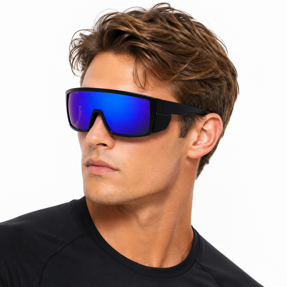 Cyclist wearing black flat-top full-rim sports sunglasses with a blue-purple mirrored one-piece lens