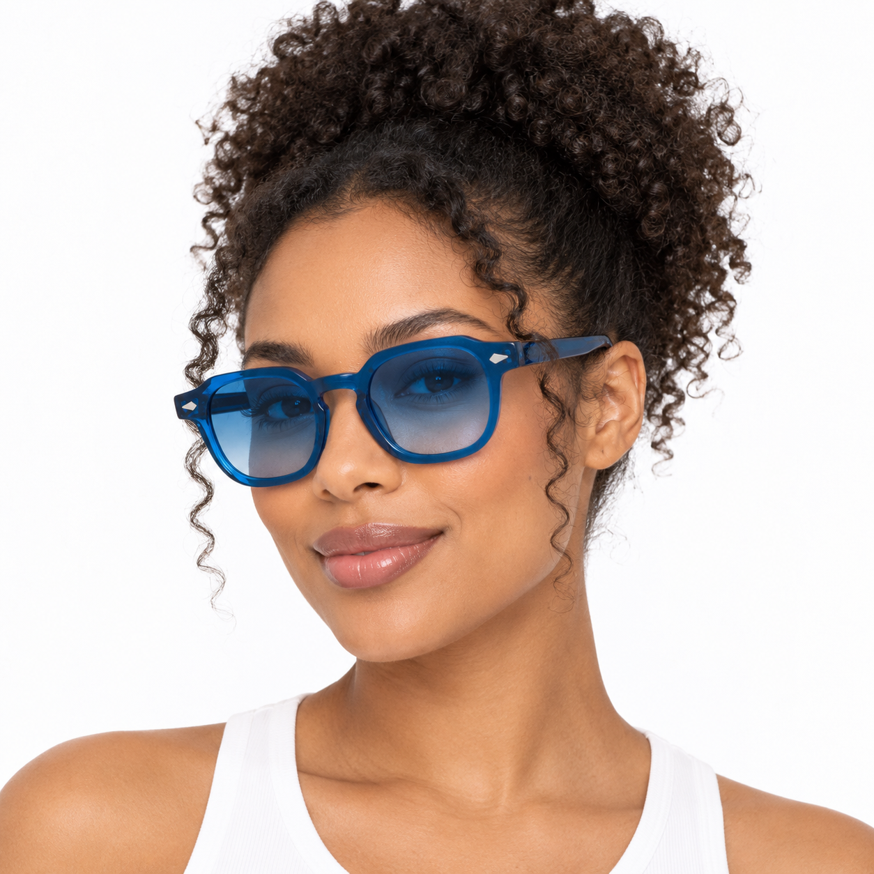 Blue full-rim square sunglasses with blue gradient lenses worn by a model