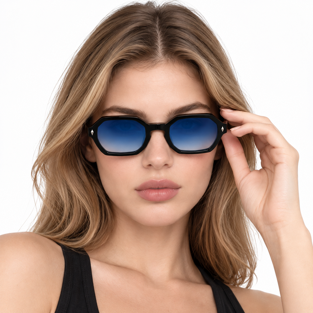 Black full-rim geometric small-frame sunglasses with blue gradient lenses worn by a model