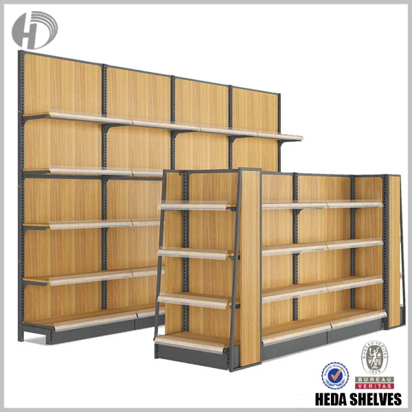Original HEDA No.00211 steel wooden gondola shelving collection with a tall continuous wall shelving run and a lower freestanding double-sided gondola, showing light oak-grain panels, dark gray steel frames and silver-colored shelf edges