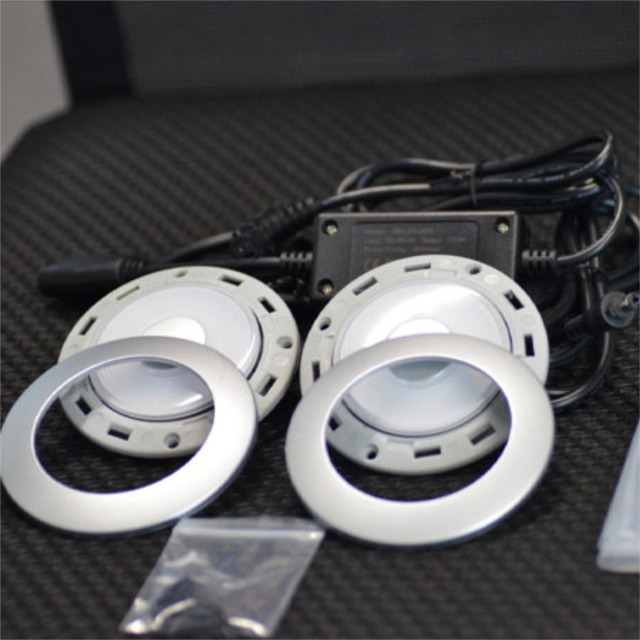 Double led reading lamp with touchable brightness control