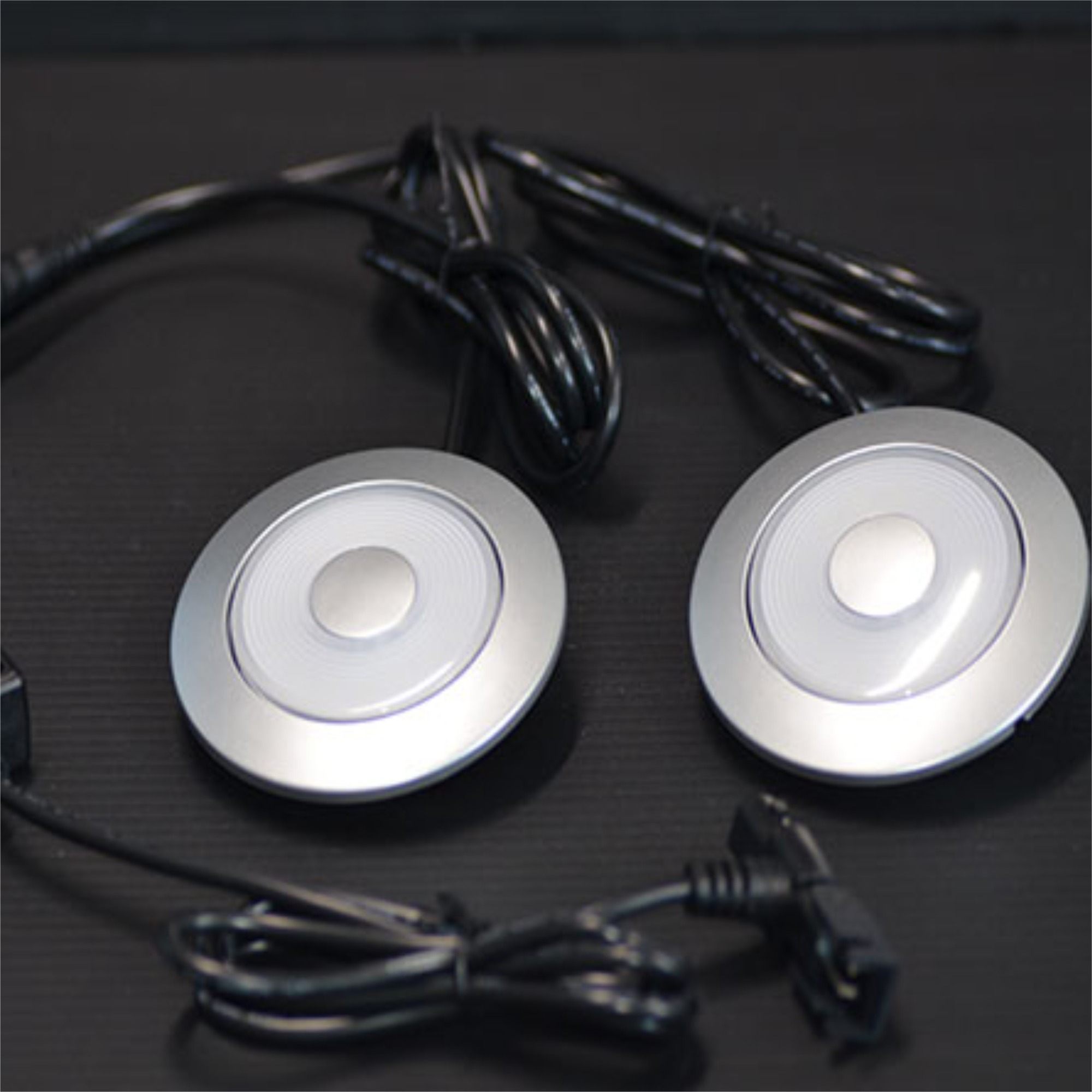 Double led reading lamp with touchable brightness control