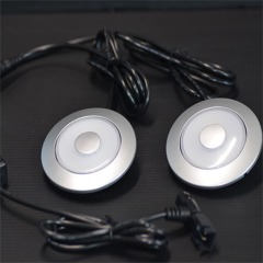 Double led reading lamp with touchable brightness control