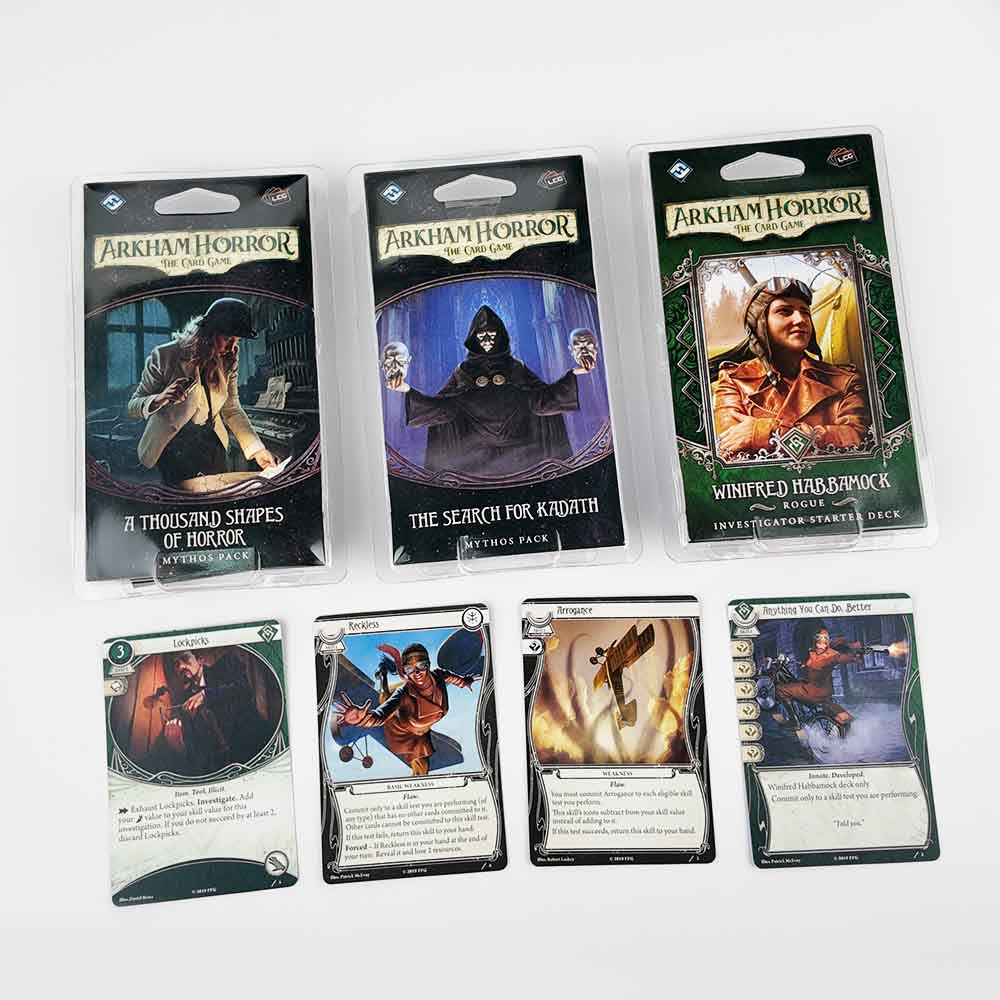 Reference sample of LCG expansion card packs with double-sided full-color cards and retail blister packaging