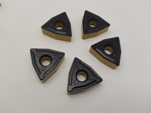 Cemented Tungsten Carbide Bar Peeling Insert TNMX1509 for Centerless Lathe Steel Rod Processing