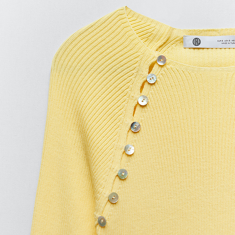 Knit sweater with buttons