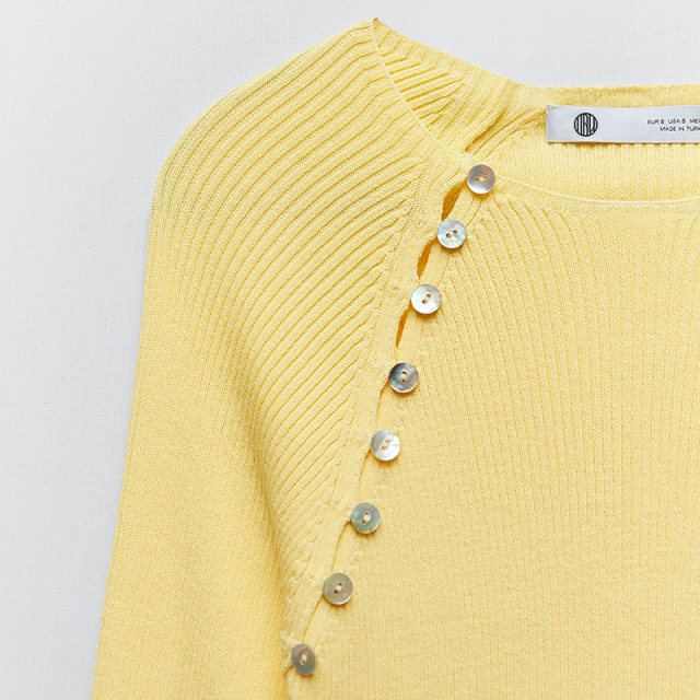 Knit sweater with buttons