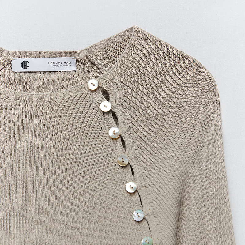 Knit sweater with buttons