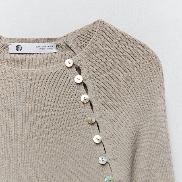 Knit sweater with buttons