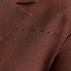 Short blazer with hollow design on the back