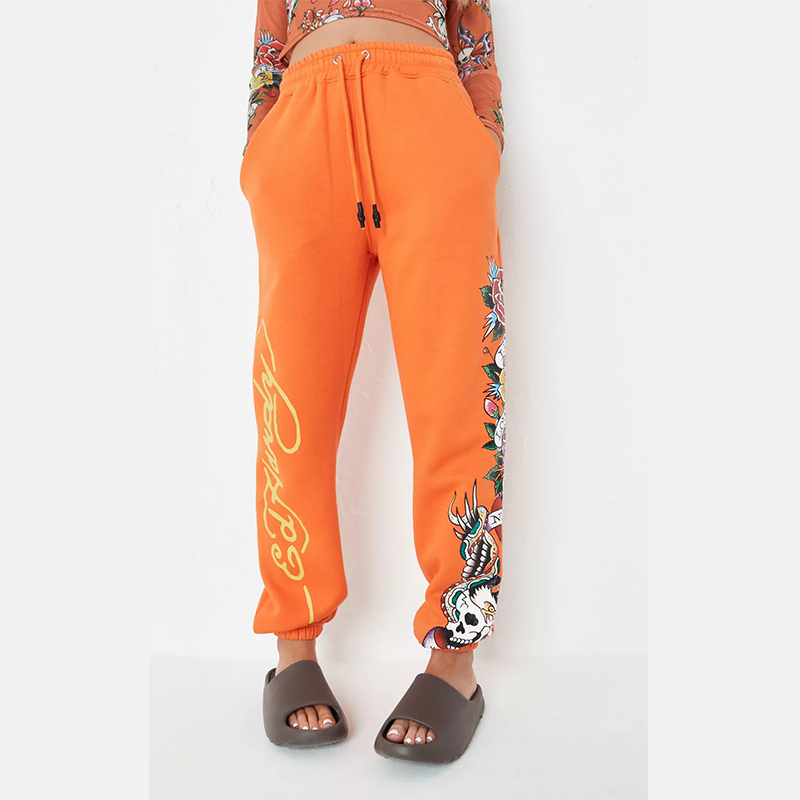 x missguided orange graphic oversized joggers