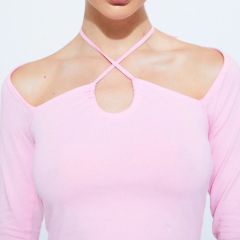 Long-sleeved top with straps on the neckline