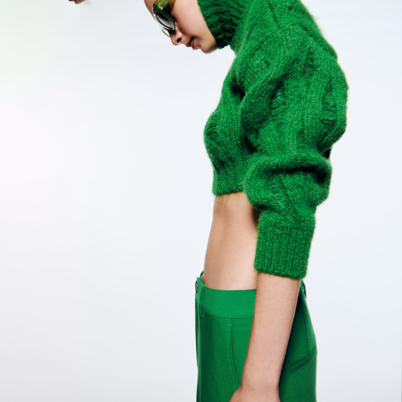 RIPPED KNIT SWEATER