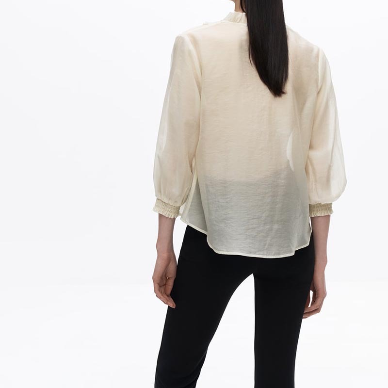 layered embellished translucent shirt