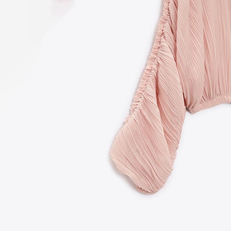 small pleated short shirt