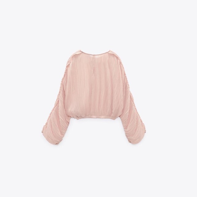 small pleated short shirt