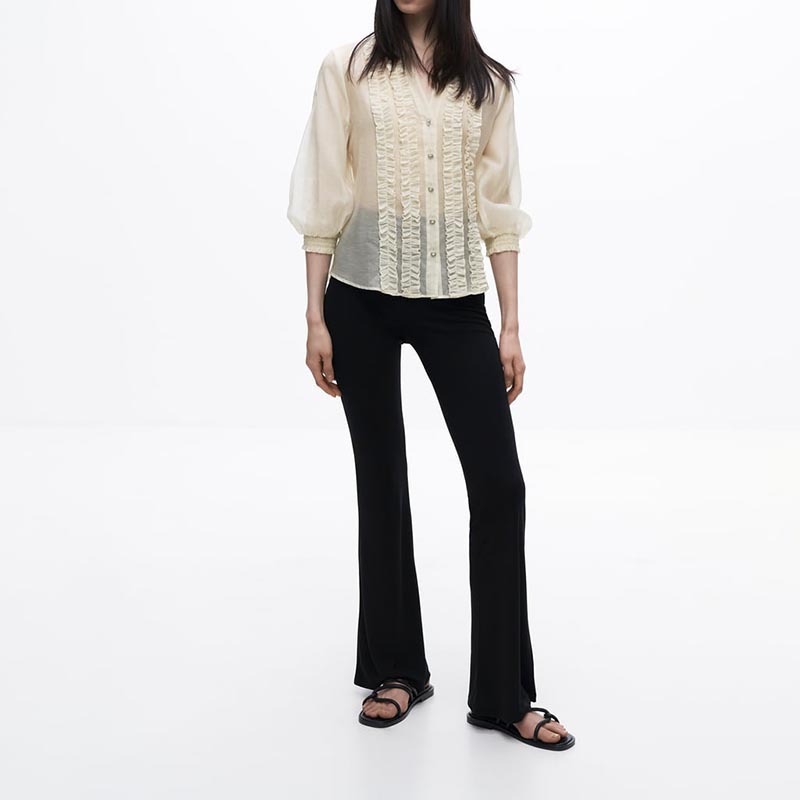 layered embellished translucent shirt